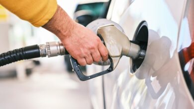 person filling gas tank at a Texas gas station