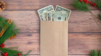 Unclaimed money concept with cash in envelope representing refunds and money owed to Texans